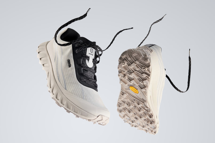 002 Core - Men by Norda in light beige and black, responsive trail running shoe with Dyneema® for technical terrain and precise ground feel