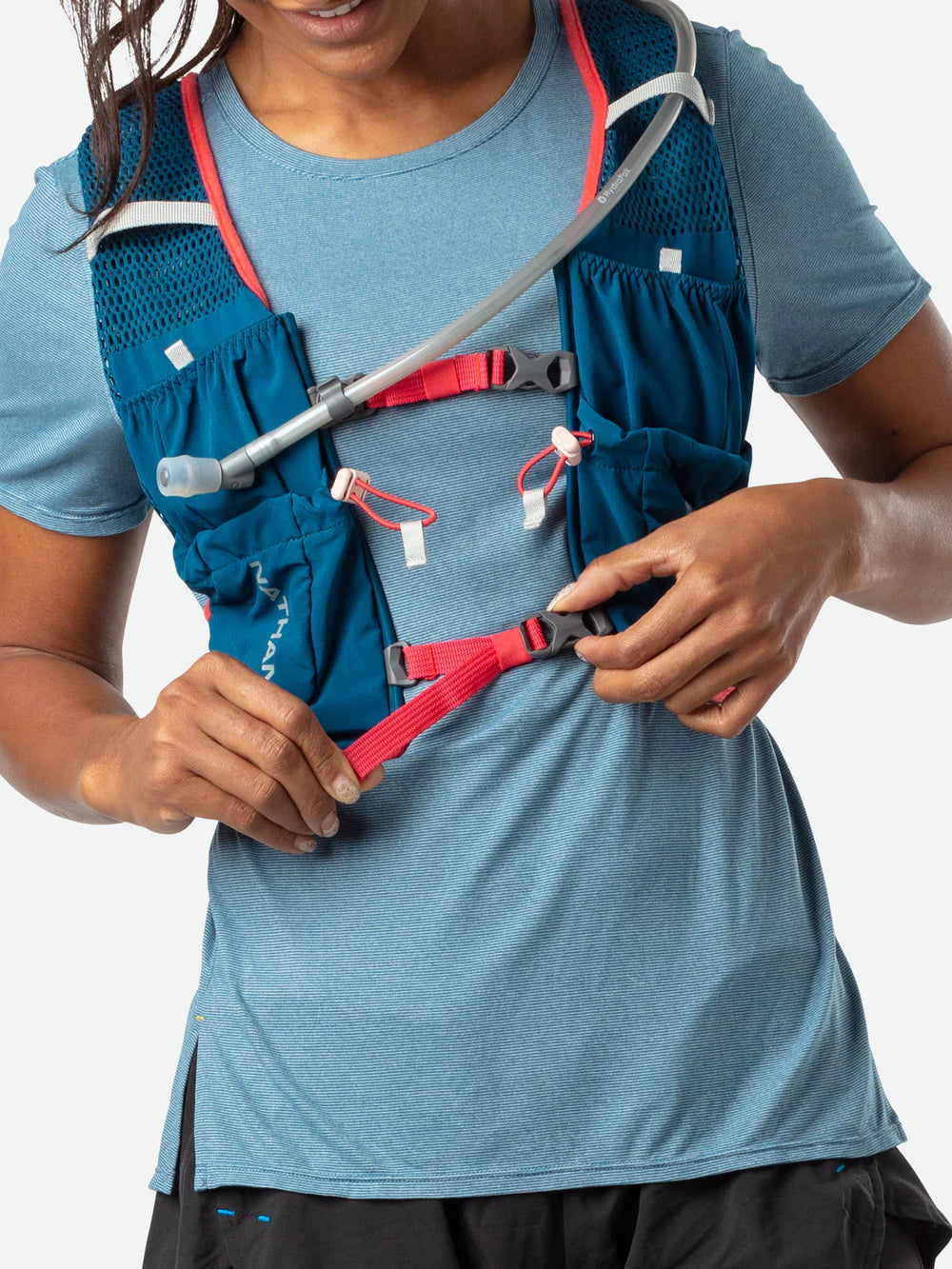 Vapor Airess 2 Lite 4L by Nathan in blue with red accents, lightweight breathable mesh running hydration vest with Adaptive-Fit hook loop design