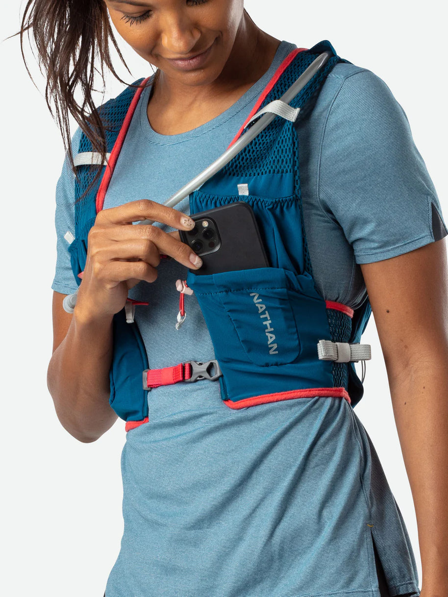 Vapor Airess 2 Lite 4L by Nathan in blue with red trim, lightweight breathable mesh running vest with adaptive-fit hook loop design