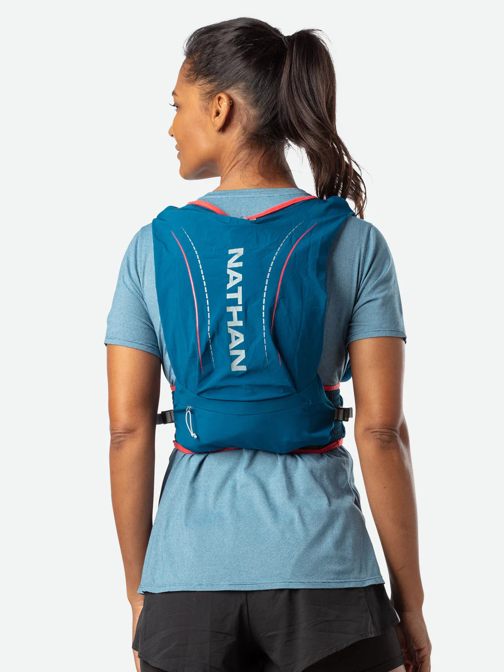 Vapor Airess 2 Lite 4L by Nathan in blue with adaptive-fit, breathable mesh, lightweight running pack designed for outdoor activities