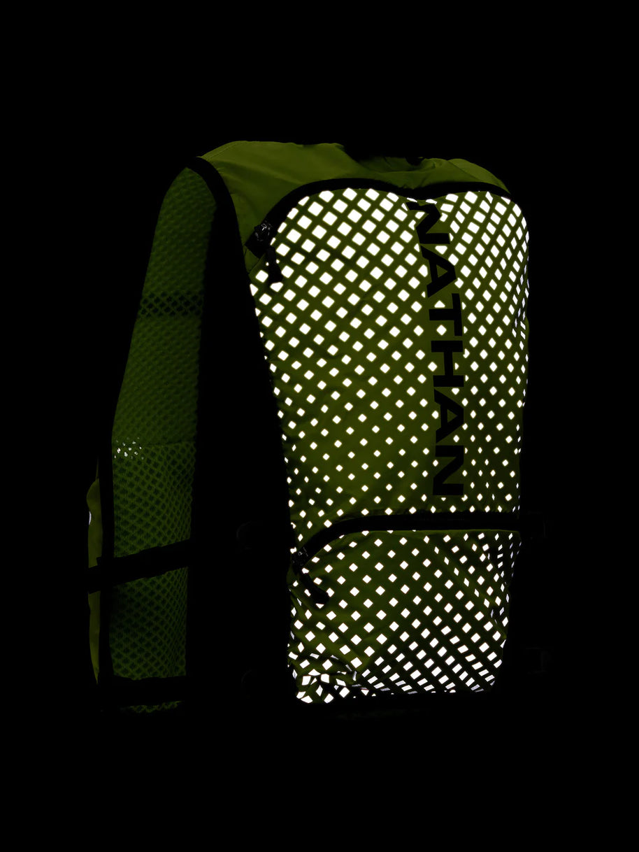 Hypernight Quick Start 2.0 4L by Nathan in reflective green with geometric print, minimalist hands-free hydration pack for running safety