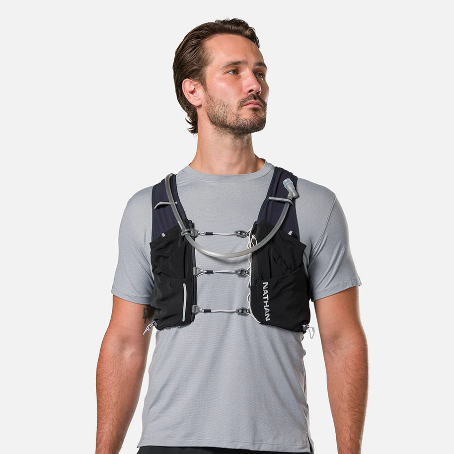 Pinnacle Pro 12L - Men by Nathan in black with slider sternum cords and Quick-Fit™ system, lightweight hydration vest for running