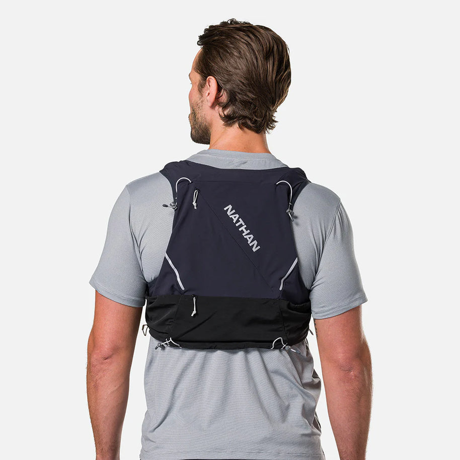 Pinnacle Pro 12L - Men by Nathan in black with slider sternum cords and Quick-Fit adjustment system for running and outdoor use