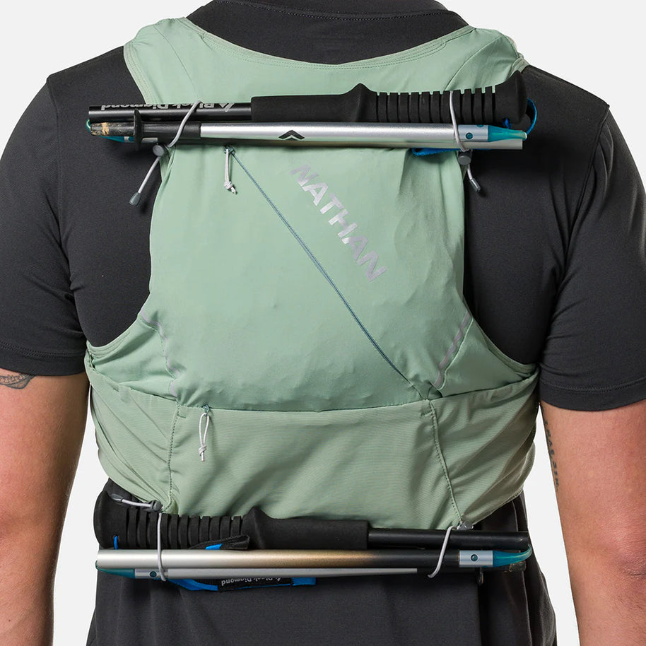 Pinnacle Pro 12L - Men by Nathan in sage green with slider sternum cords and Quick-Fit™ system for running and outdoor use
