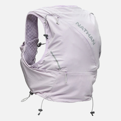 Pinnacle Pro 12L - Women by Nathan in light lavender with slider sternum cords and Quick-Fit system for running comfort