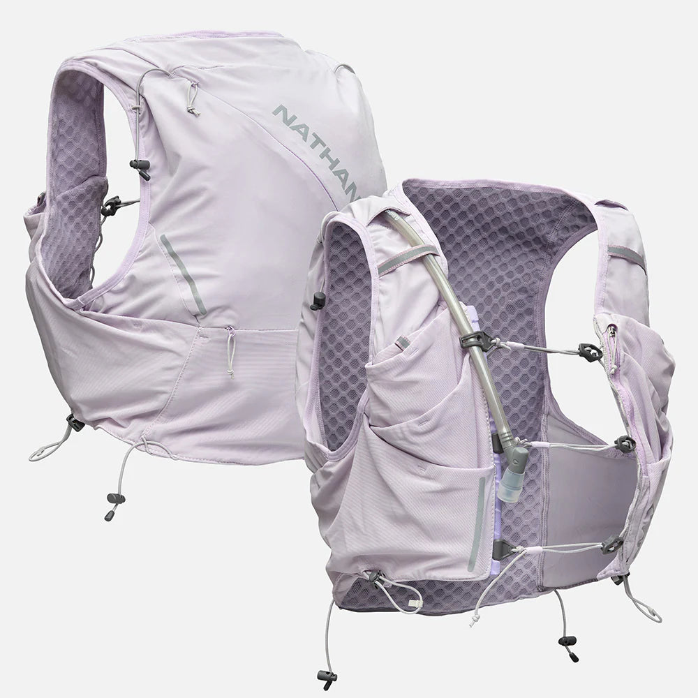 Pinnacle Pro 12L - Women by Nathan in light purple with slider sternum cords and Quick-Fit system for running and outdoor use
