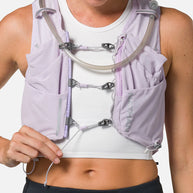 Pinnacle Pro 12L - Women by Nathan in light purple with slider sternum cords and Quick-Fit adjustment for running hydration and comfort