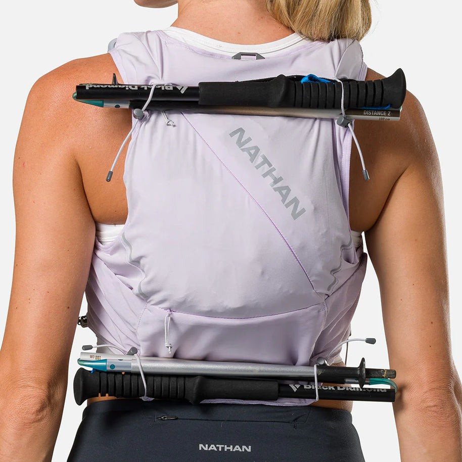 Pinnacle Pro 12L - Women by Nathan in light grey with slider sternum cords and Quick-Fit system, ideal for running and trail use