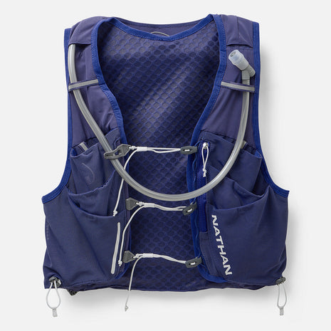 Nathan Pinnacle Pro 12L women's running vest in Indigo/Light Blue, front view with soft flasks and tubes