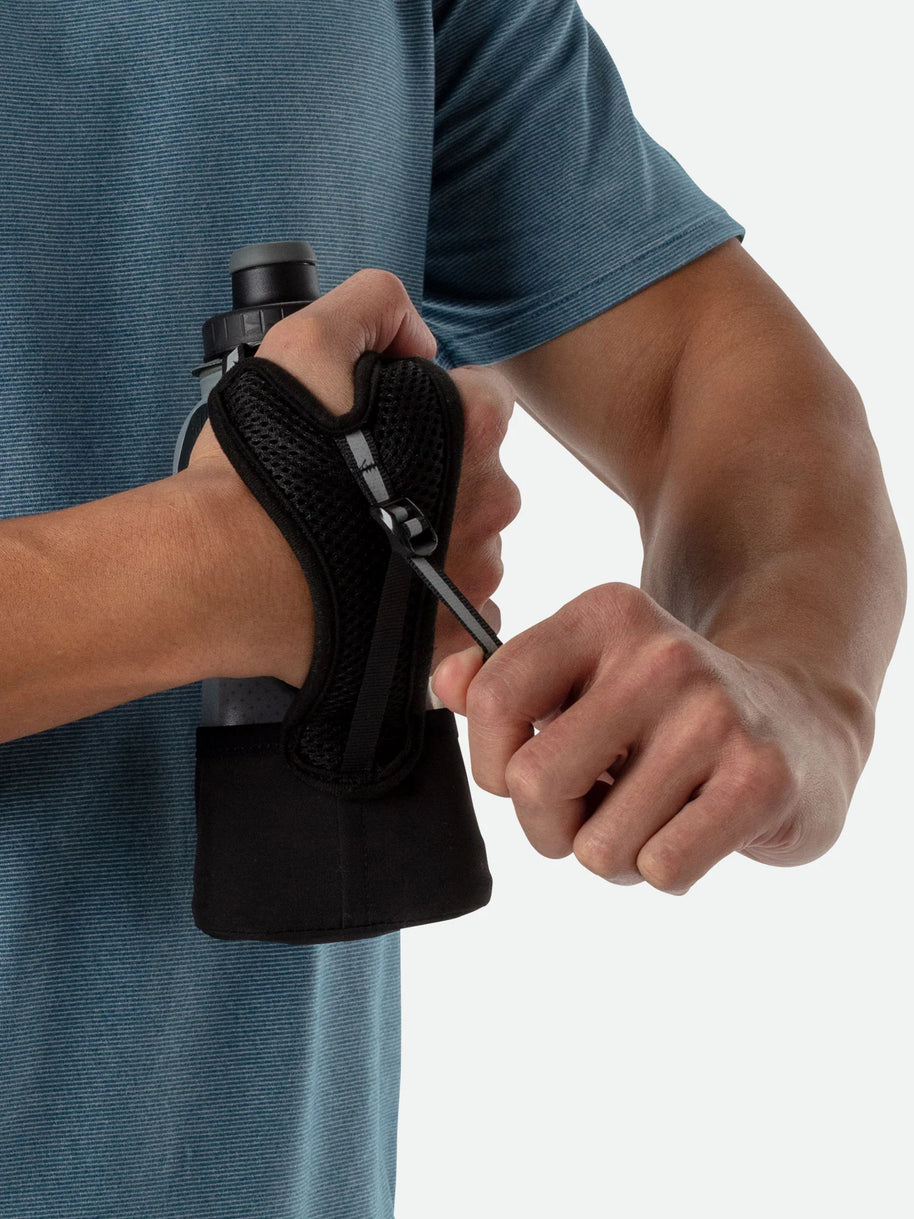 Quick Squeeze Lite 12oz Insulated Handheld by Nathan in black with adjustable strap, lightweight and easy to squeeze for running hydration