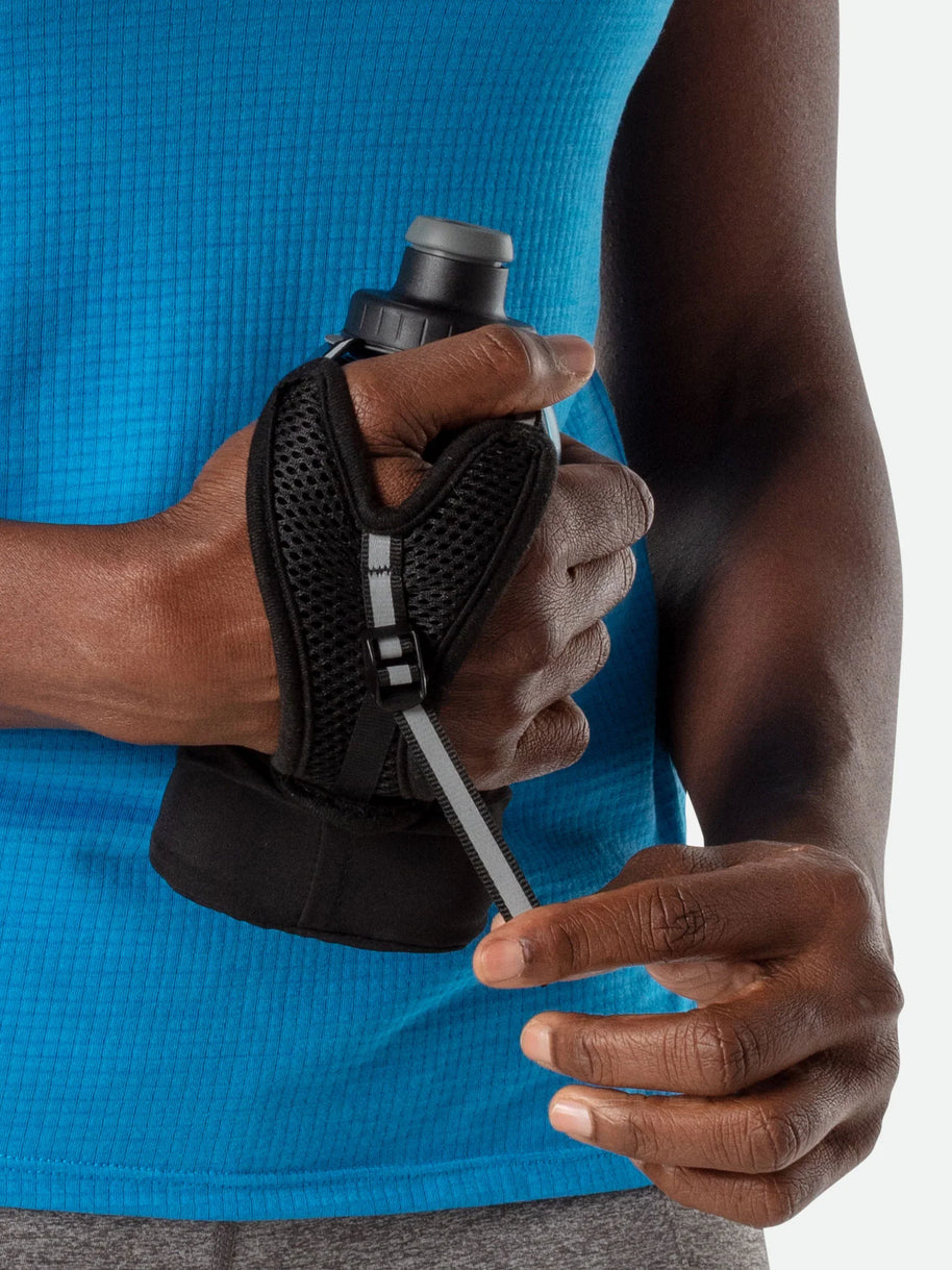 Quick Squeeze Lite 12oz Handheld by Nathan in black with adjustable strap and no-slip insert, lightweight hydration for running and outdoor use