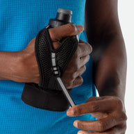 Quick Squeeze Lite 12oz Handheld by Nathan in black with adjustable strap and no-slip insert, lightweight hydration for running and outdoor use