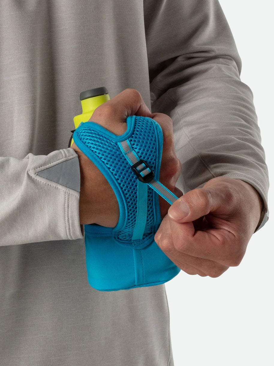Quick Squeeze Lite 12oz Handheld by Nathan in lime green and blue with adjustable strap, lightweight grip, no-slip insert for running hydration