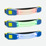 Lightbender RX Lighted Armband by Nathan showing red, green, blue LED options with 6-lumen safety light for running outdoors