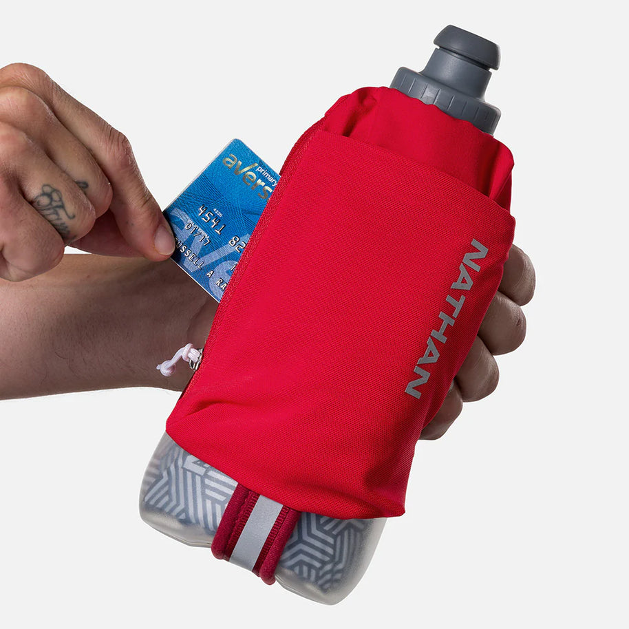 Speed Draw 2 18oz Insulted Flask by Nathan in red with easy-grip shape, insulated for cooler fluids, featuring power mesh pocket for storage