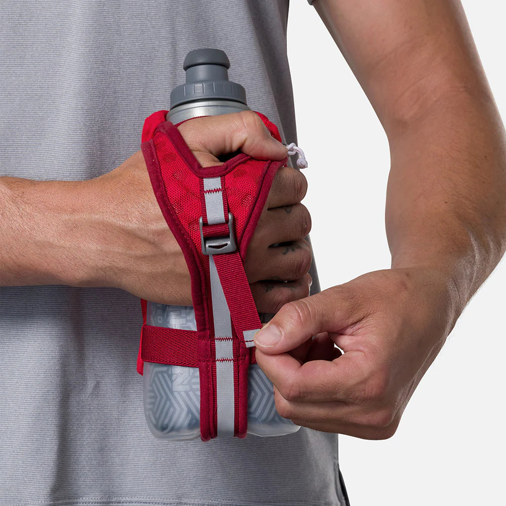 Speed Draw 2 18oz Insulted Flask by Nathan in red with grey bottle, insulated handheld flask with easy grip and mesh pocket for running and outdoor use