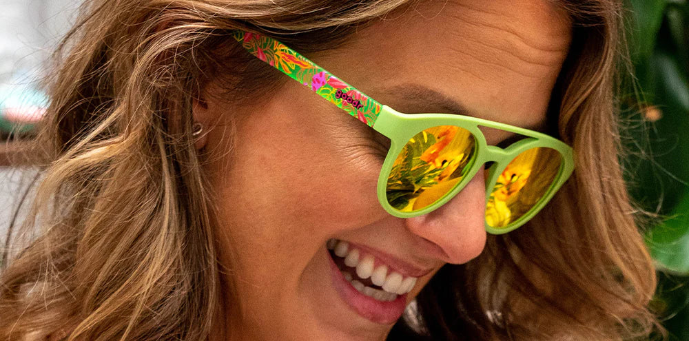 Need for Seed by Goodr in bright green with pink and orange plant-inspired design, lightweight glasses for proud plant parents in USA-based store