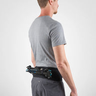 Running Band by Naked in black, high-performance waist belt carrying trekking poles, fuel, and accessories for running and outdoor use