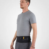 Running Band by Naked in black waist belt designed for carrying fuel, fluids, and accessories during running and outdoor activities