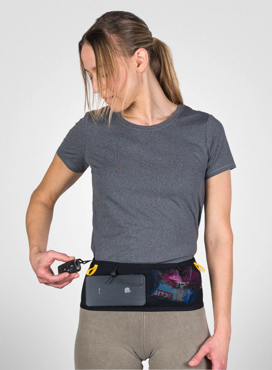 Running Band by Naked in black with mesh pockets, lightweight waist belt for carrying fuel, fluids, and accessories during running or trekking