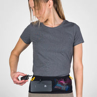 Running Band by Naked in black with mesh pockets, lightweight waist belt for carrying fuel, fluids, and accessories during running or trekking