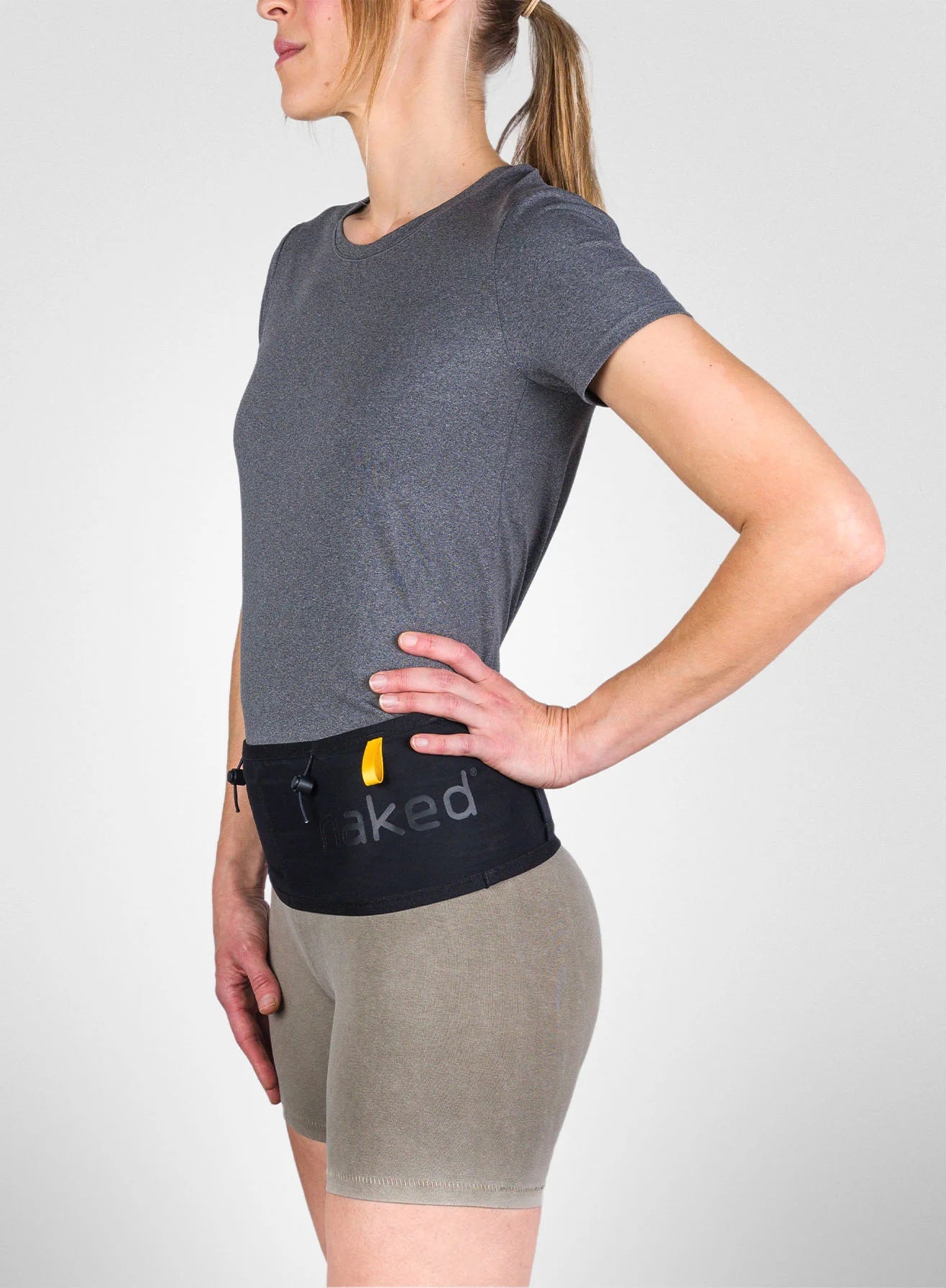 Running Band by Naked in black waist belt for carrying fuel and accessories, high-performance design for running and outdoor use