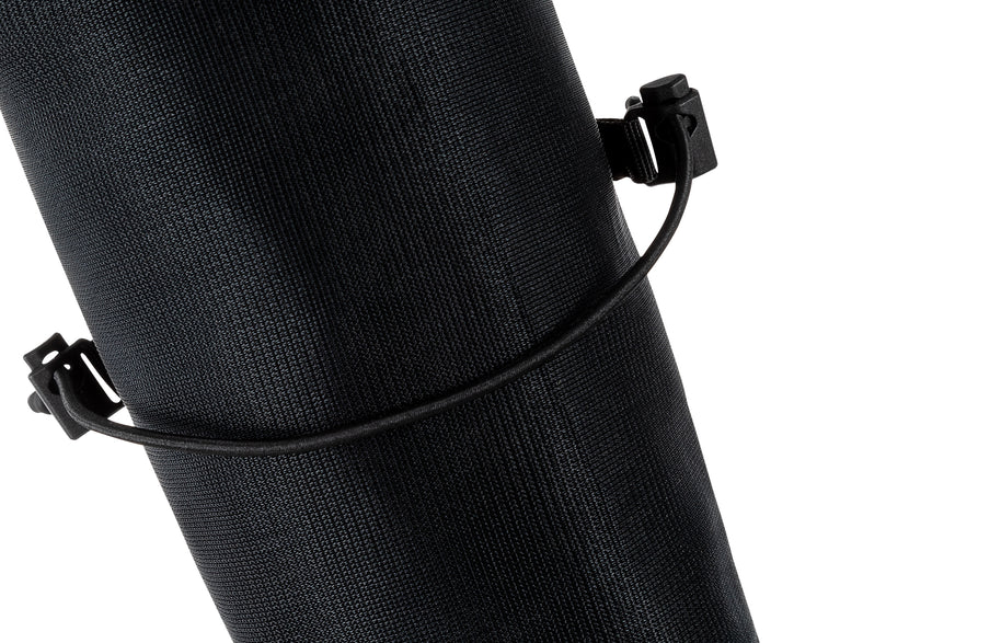 Close-up of the bungee compression strap with clips wrapped around the UltrAspire Pole Quiver in Black