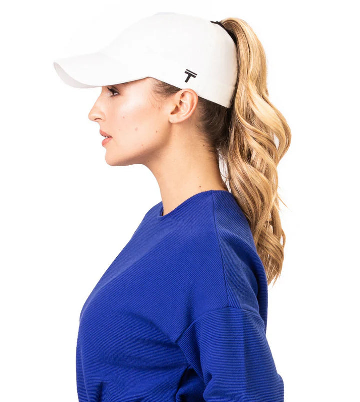 Performance 2.0 Ponytail Cap by Top Knot in white, designed for modern women with ponytail opening, ideal for running and outdoor activities.