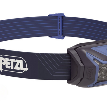 Actik Lamp by Petzl in blue and black, 450 lumens headlamp designed for running, trekking, and mountaineering safety outdoors