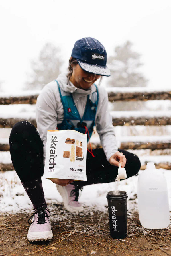Sport Recovery Drink Mix by Skratch Labs in white and orange packaging, rapid refuel and rehydrate for intense workouts