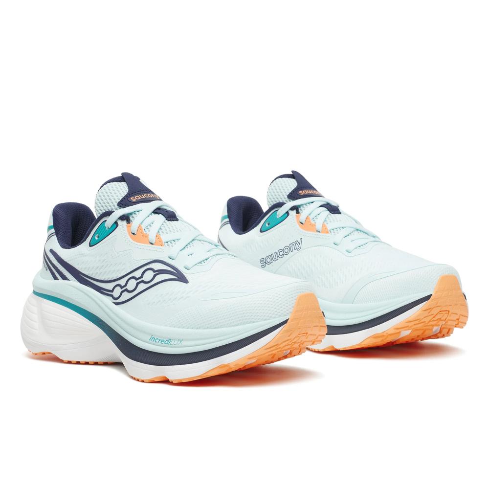 Pair of Saucony Hurricane 26 women's running shoes in Spa/Naval, front three-quarter view with orange heel accents
