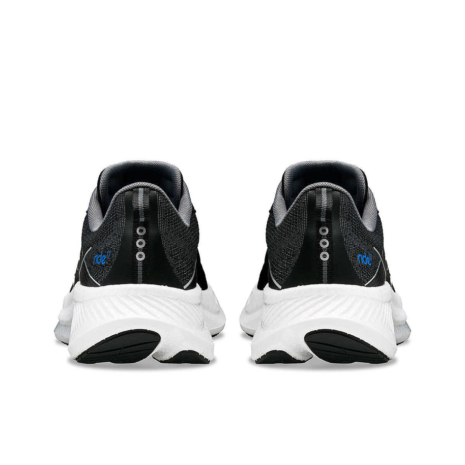 Ride 17 - Women by Saucony in black and white with PWRRUN+ foam cushioning, comfortable road running shoes ideal for daily runs.