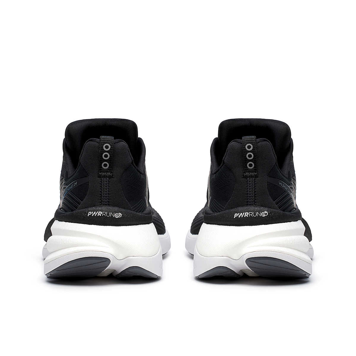 Hurricane 24 - Women by Saucony in black and white, max cushioned running shoe with dual-foam for road running and comfort