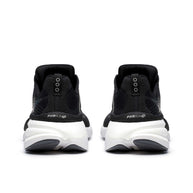 Hurricane 24 - Women by Saucony in black and white, max cushioned running shoe with dual-foam for road running and comfort