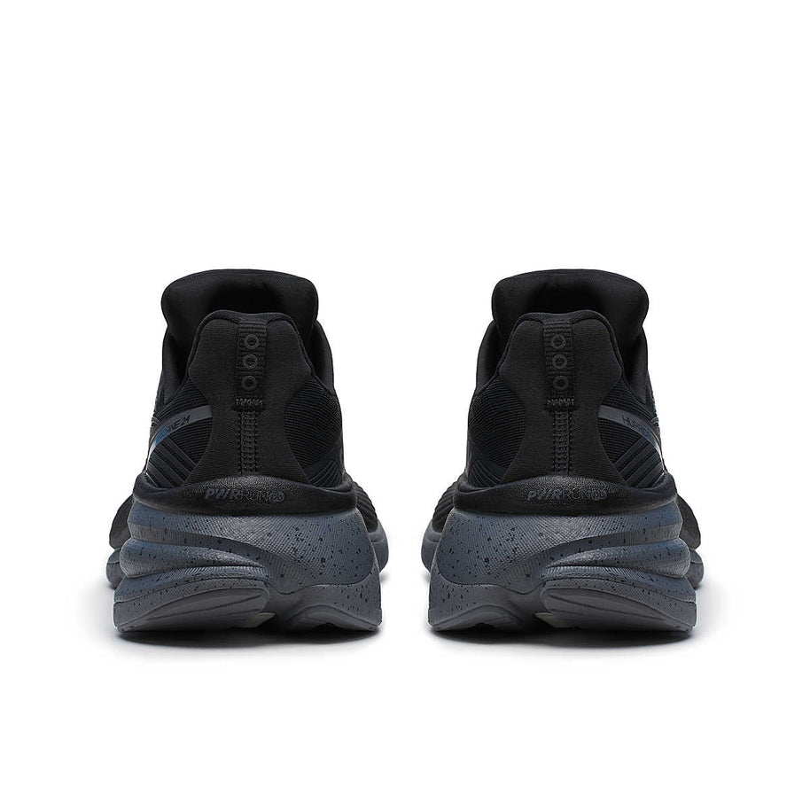 Hurricane 24 - Women by Saucony in black and dark grey, max cushioned running shoe with dual-cush for road running comfort