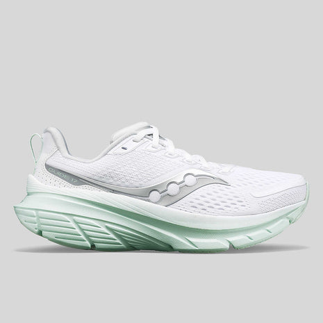 Guide 17 - Women by Saucony in white and mint with PWRRUN cushioning and CenterPath technology for natural, secure running