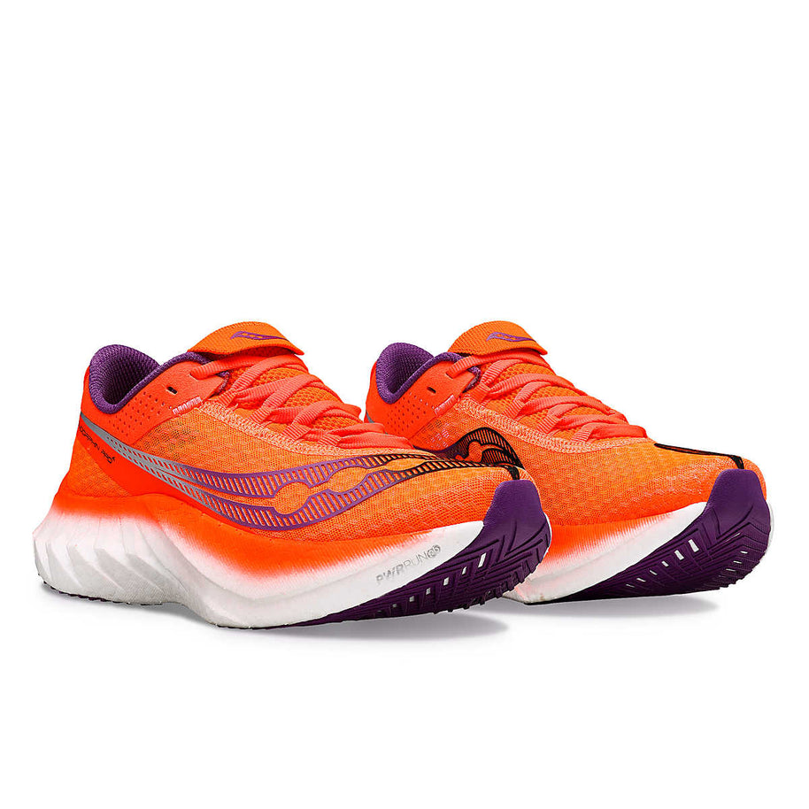 Endorphin PRO 4 - Women by Saucony in bright orange and purple, responsive road running shoes designed for long-distance performance