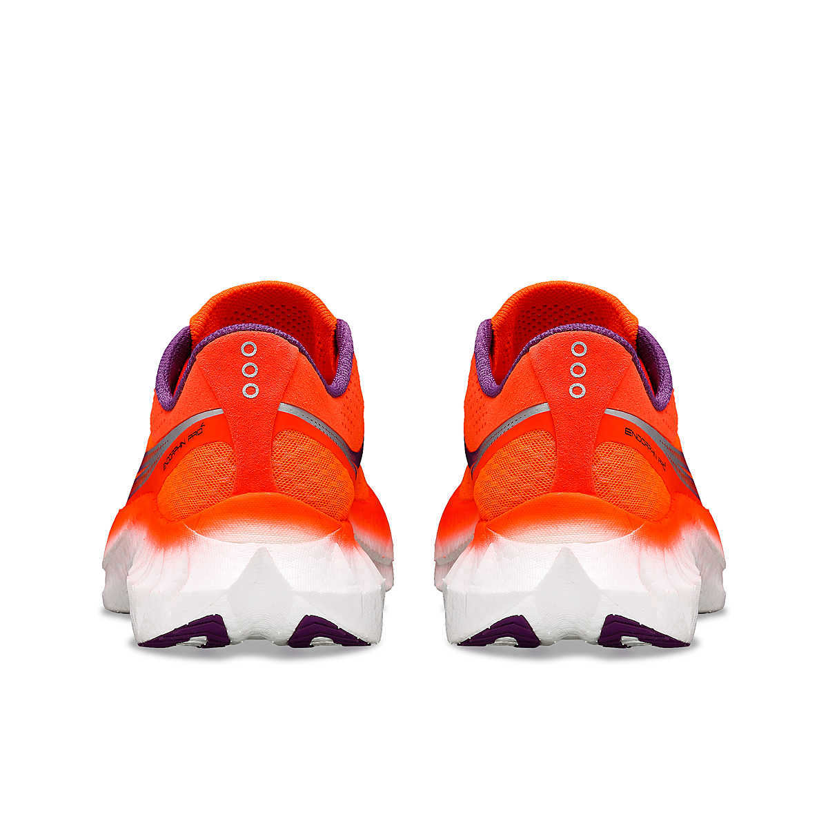 Endorphin PRO 4 - Women by Saucony in bright orange and purple, responsive road running shoes for long-distance performance