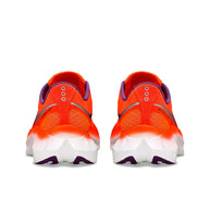 Endorphin PRO 4 - Women by Saucony in bright orange and purple, responsive road running shoes for long-distance performance