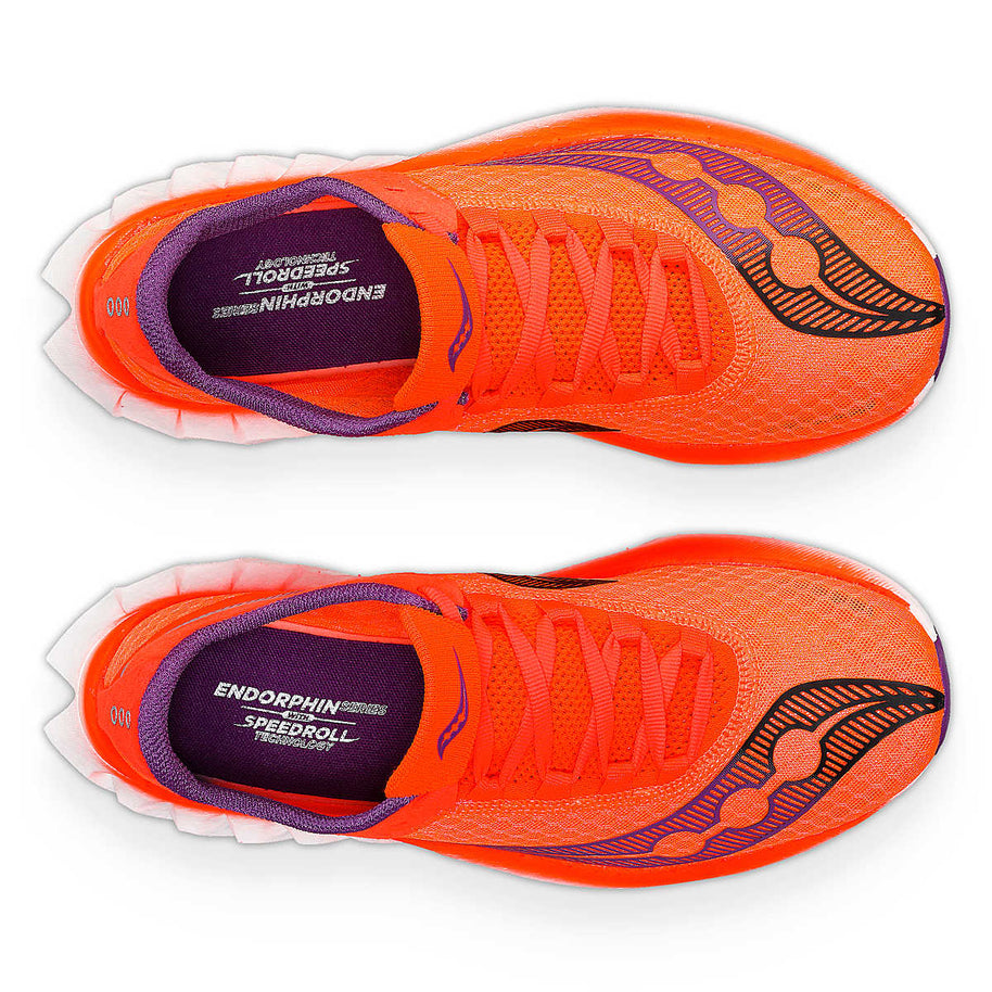 Endorphin PRO 4 - Women by Saucony in bright orange with purple accents, responsive road running shoes designed for long-distance performance
