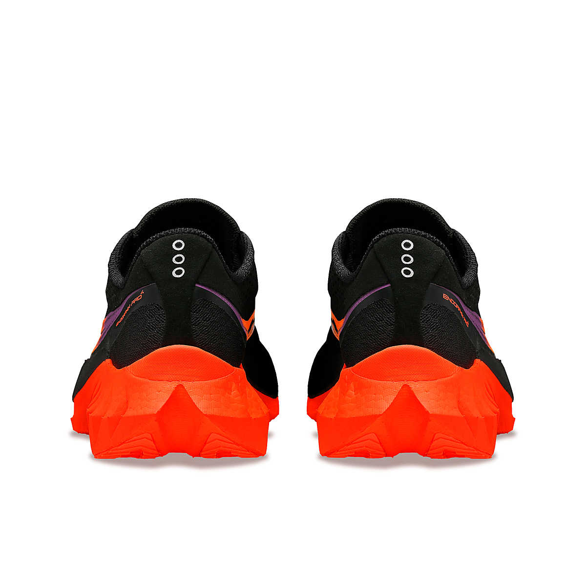 Endorphin PRO 4 - Women by Saucony in black and bright orange, responsive road running shoes designed for long-distance performance
