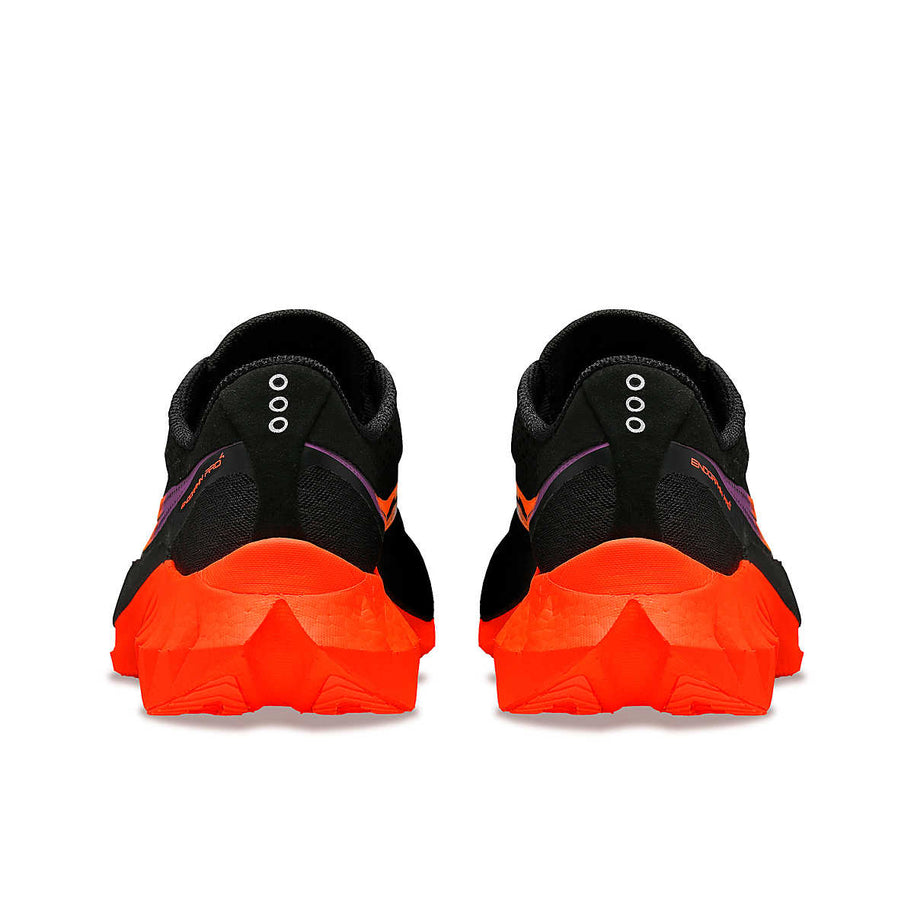 Endorphin PRO 4 - Women by Saucony in black and bright orange, responsive road running shoes designed for long-distance performance
