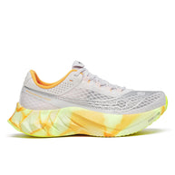 Endorphin PRO 4 - Women by Saucony in white and yellow, responsive road running shoes designed for long-distance performance