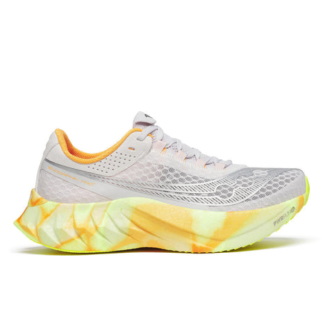 Endorphin PRO 4 - Women by Saucony in white and yellow, responsive road running shoes designed for long-distance performance