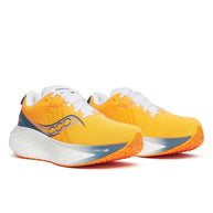 Saucony Triumph 22 - Women running shoes in bright orange with white and blue accents featuring advanced foam for joyful, comfortable running.