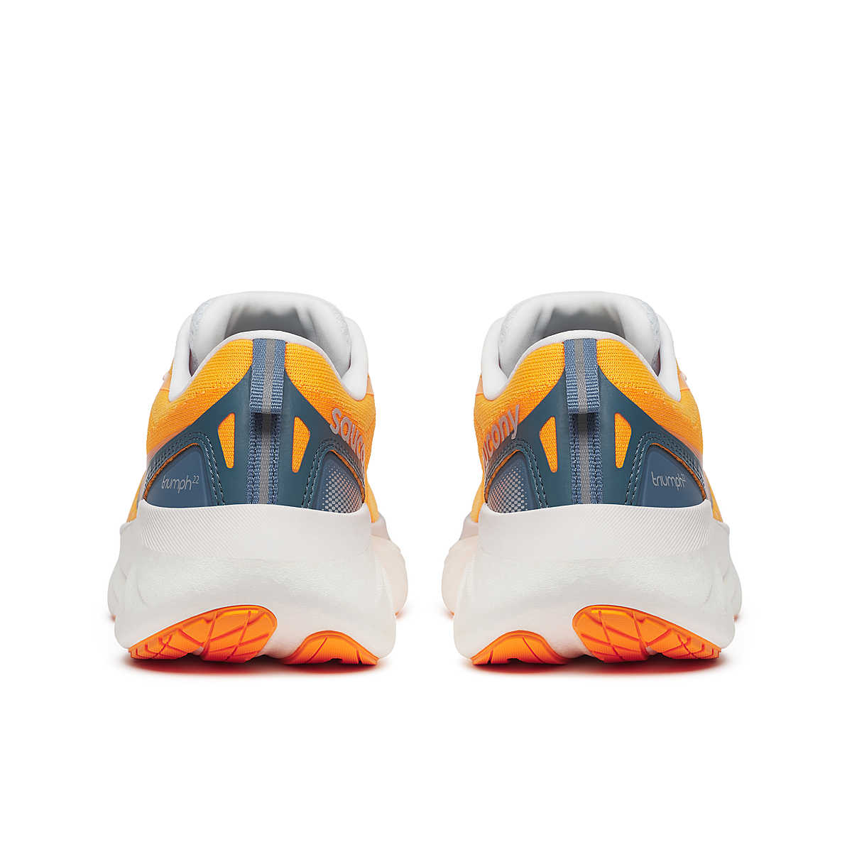 Saucony Triumph 22 - Women running shoes in orange and navy, featuring enhanced foam for joyful long-distance running and comfort.