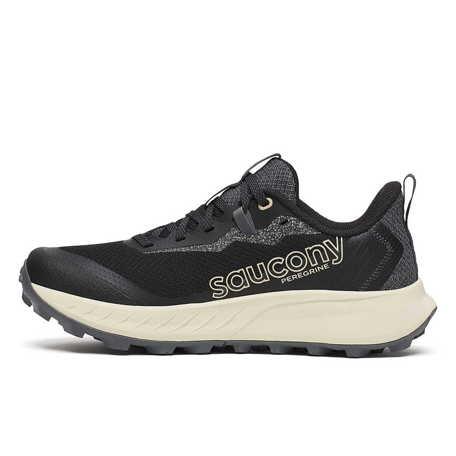 Peregrine 15 - Women by Saucony in black and beige with PWRTRAC outsole for durable grip on rugged trails, ideal for outdoor running and hiking