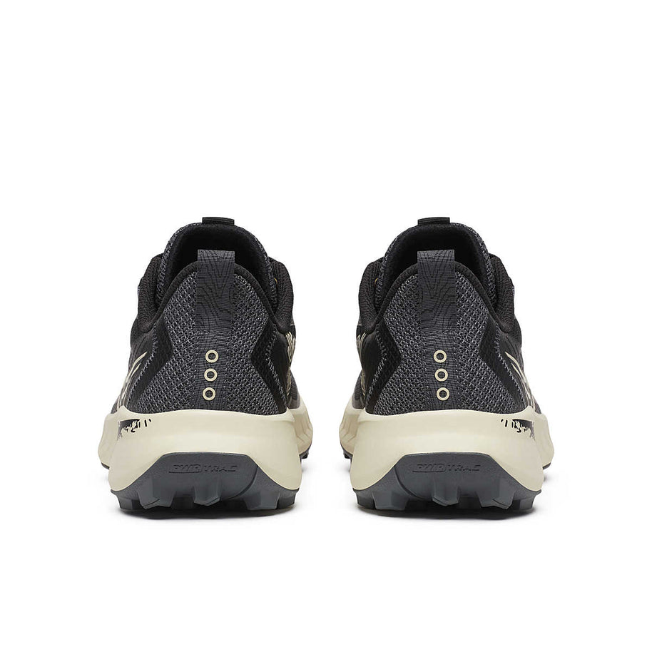Peregrine 15 - Women by Saucony in black and beige with PWRTRAC outsole for durable grip, ideal trail running and hiking shoes