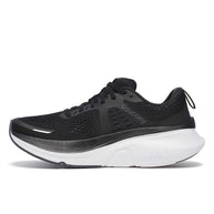 Guide 18 Wide - Women by Saucony in black and grey, cushioned road running shoe with PWRRUN technology for comfort and support