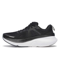 Guide 18 - Women by Saucony in black with white sole, lightweight road running shoes with PWRRUN cushioning for enhanced protection and comfort